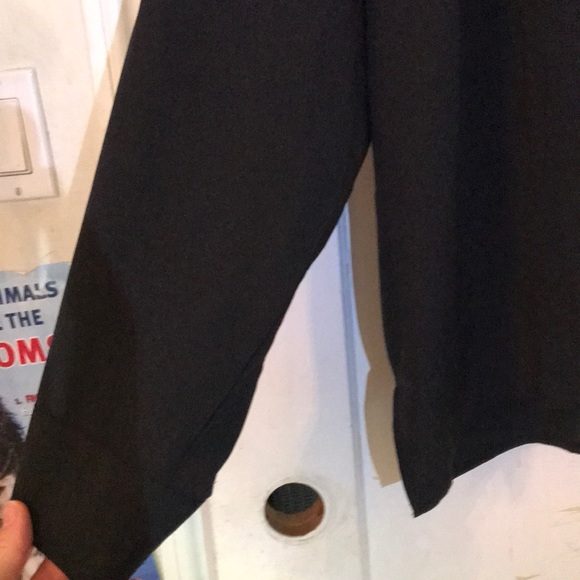A black button down blouse. - Picture 6 of 6